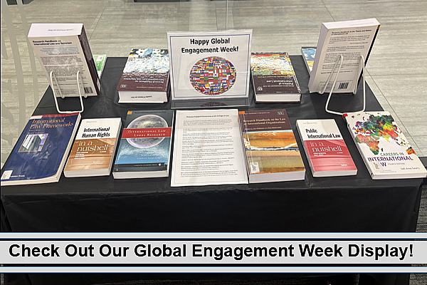 2025 Global Engagement Week Display featuring books and databases on International Law.