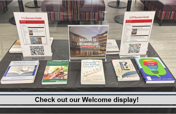 Welcome display with law school success study aids and QR codes for 1L and LLM Guides